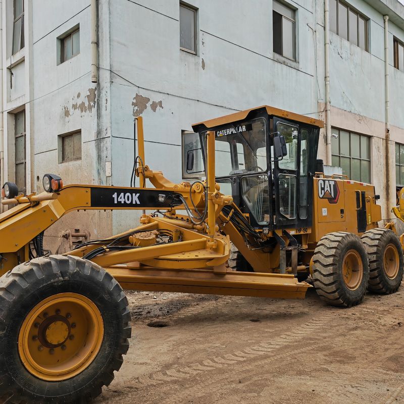 Использованный экскаватор землеуровнитель Caterpillar CAT140K дорожный станок подержанный японский тракторный двигатель в хорошем состоянии